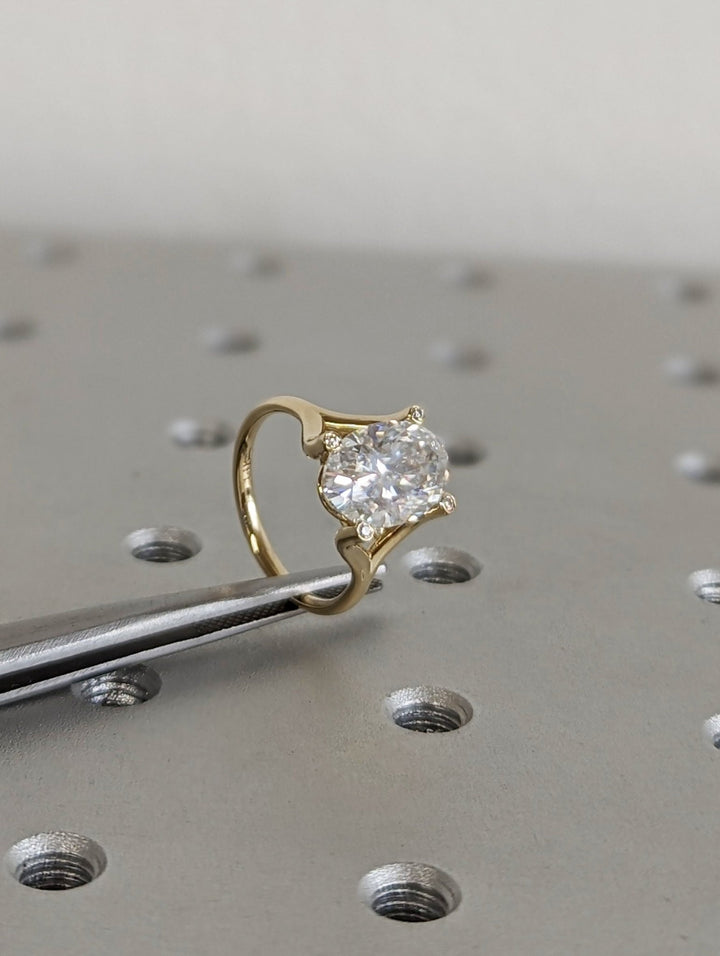 Timeless oval diamond engagement ring with modern style