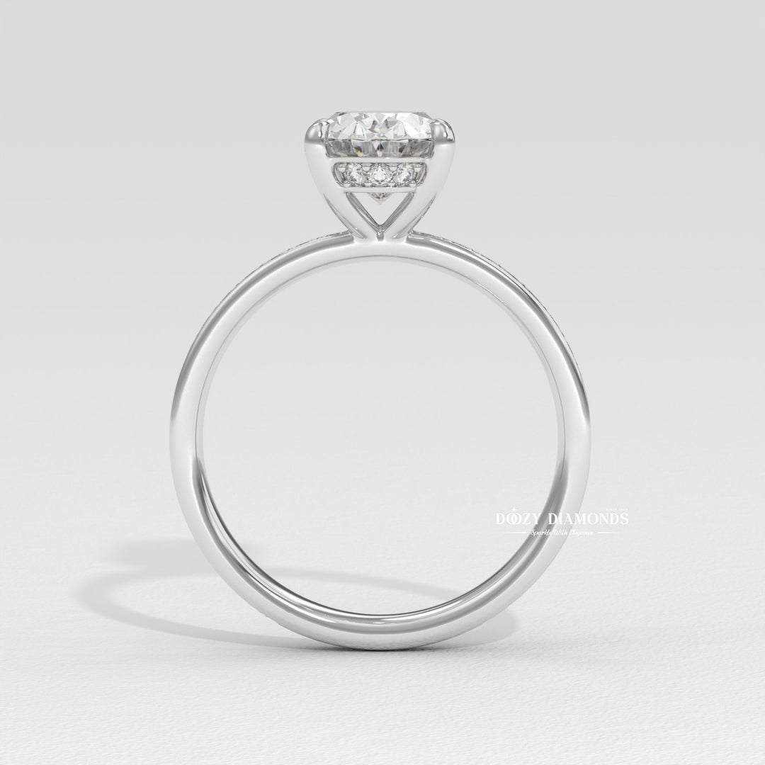 Horizontal oval channel set ring
East-west oval channel ring
Unique channel set bridal ring