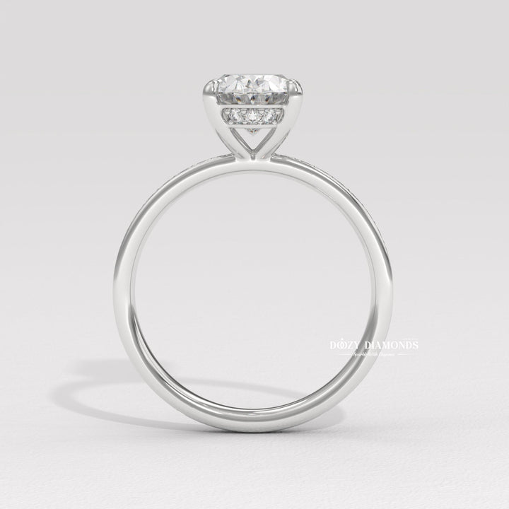Horizontal oval channel set ring
East-west oval channel ring
Unique channel set bridal ring