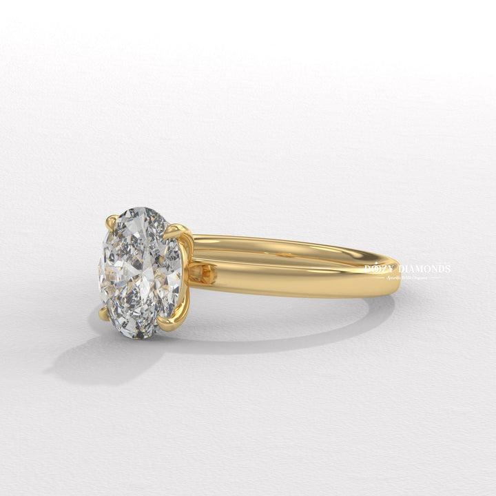 Oval Solitaire Engagement Ring
8. Elongated Oval Diamond Solitaire
9. Oval Shape 4-Prong Setting
10. Minimalist Oval Solitaire White Gold