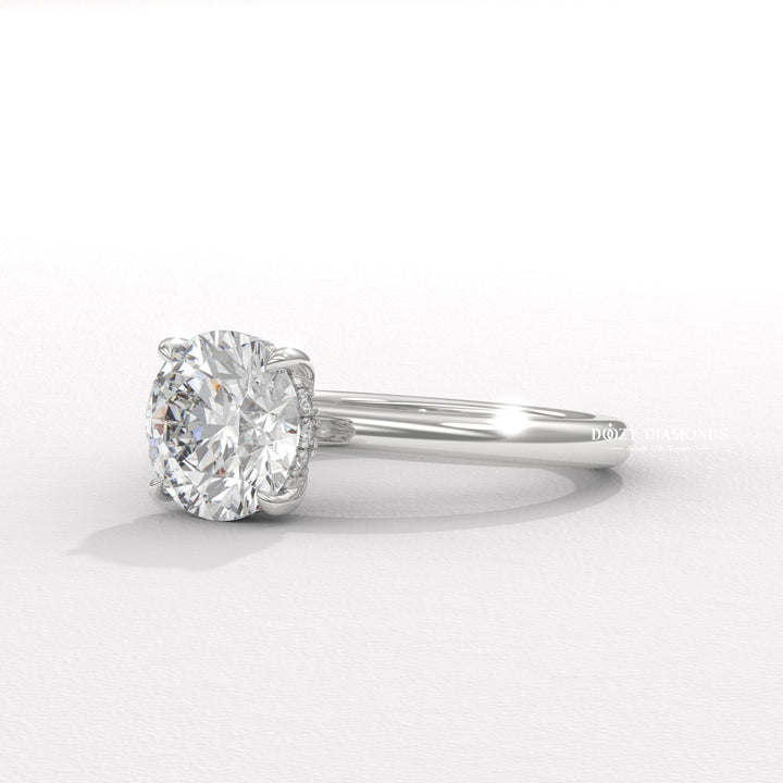 Hidden halo engagement ring
Round brilliant cut diamond ring
Lab grown diamond ring
Hidden halo diamond ring
Sustainable diamond engagement ring