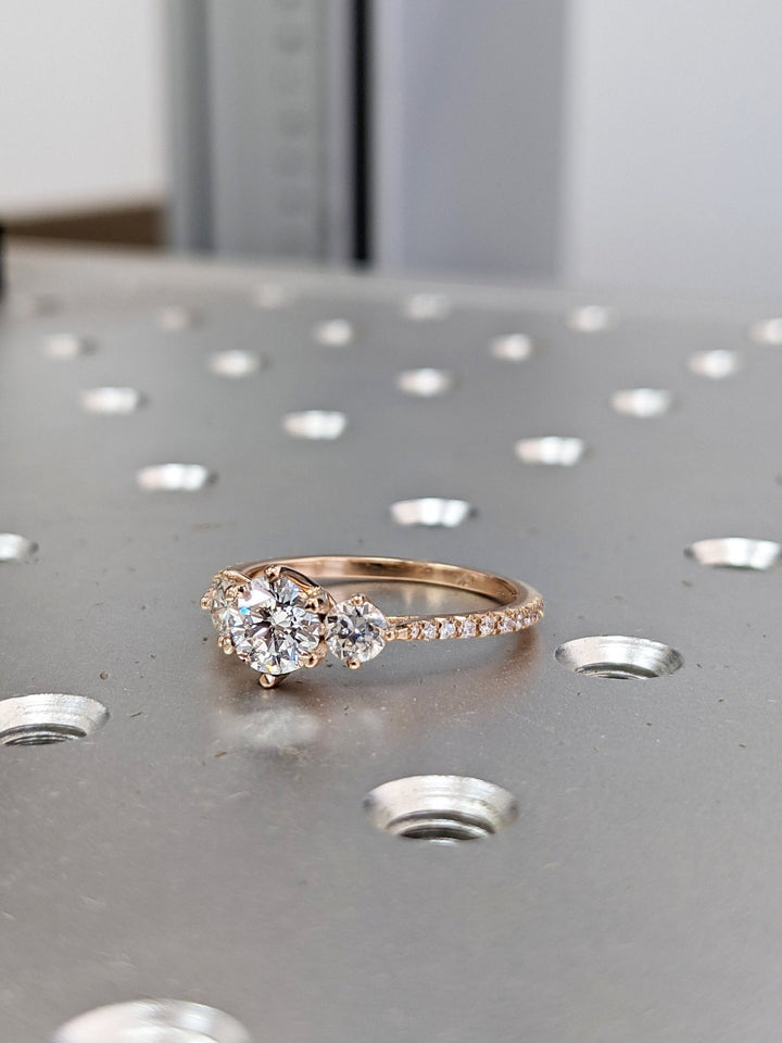 Luxury round diamond engagement ring with side stones