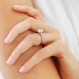 round-shaped-moissanite-solitaire-style-engagement-ring