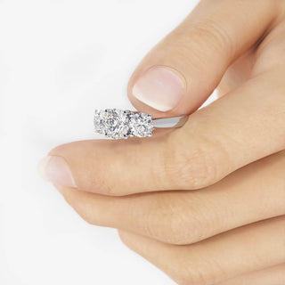1-0-ct-round-shaped-moissanite-three-stone-style-engagement-ring-11
