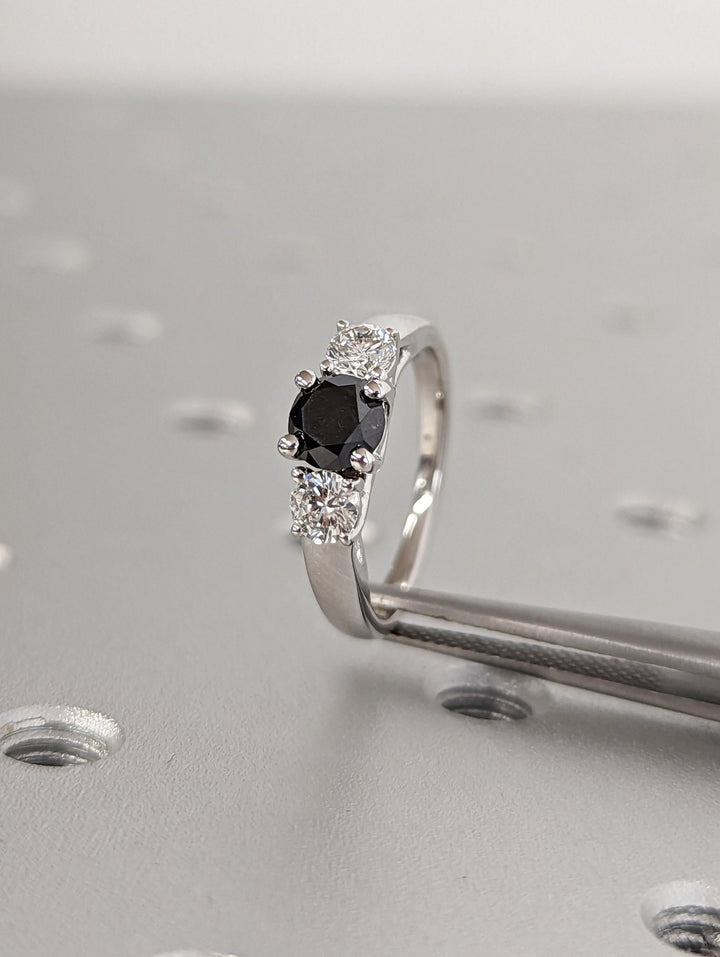Women's fine diamond jewelry ring with three stone setting