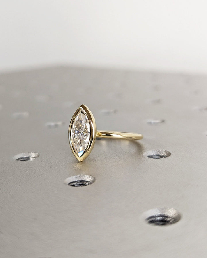 Sophisticated marquise diamond proposal ring