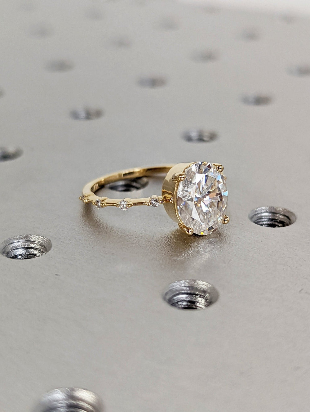 Statement oval bridal ring with petite pave band