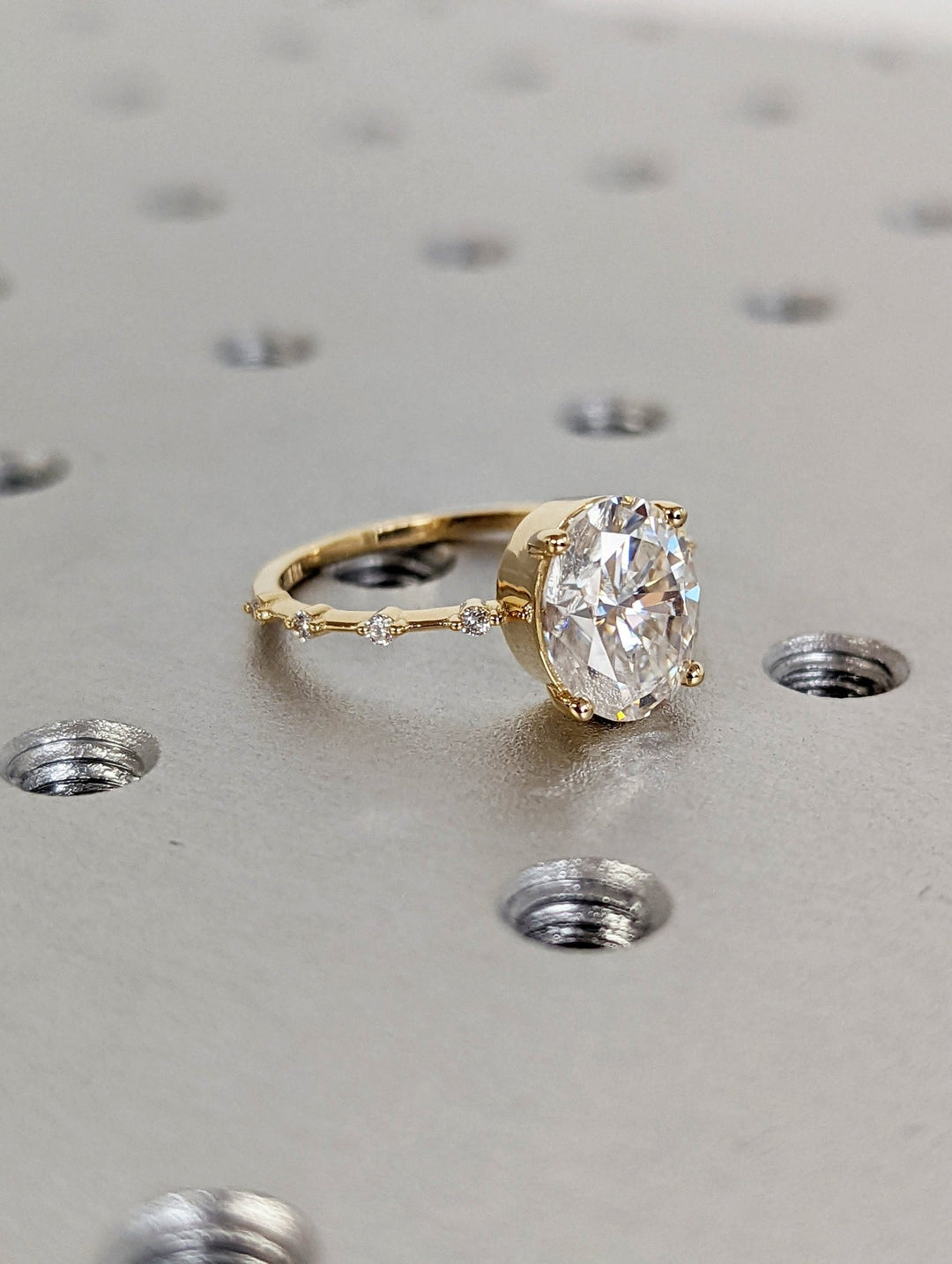Statement oval bridal ring with petite pave band