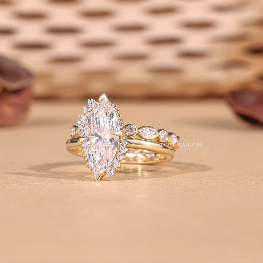 Marquise cut bridal set with side stones, Marquise cut bridal set with diamond accents, Marquise cut bridal set with milgrain, Marquise cut bridal set with filigree, Marquise cut bridal set with vintage style, 
