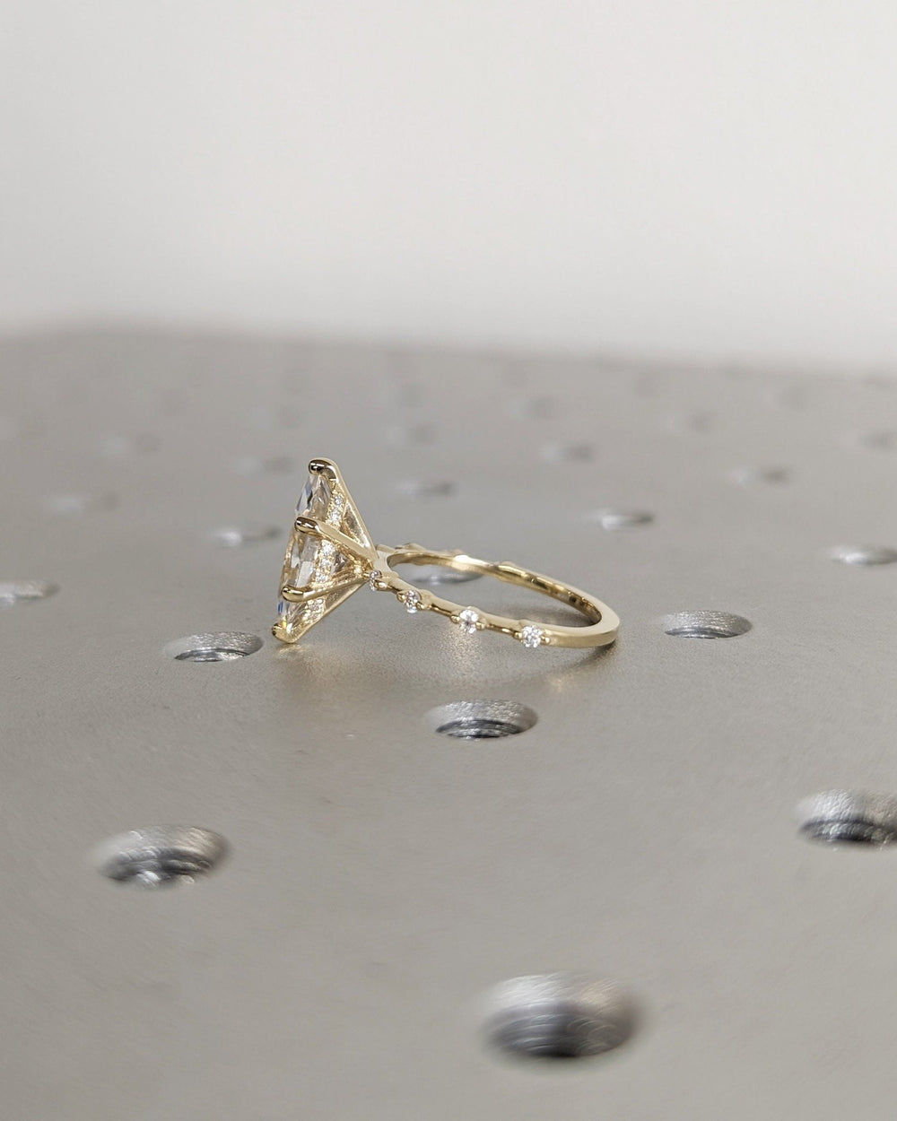 Elegant marquise diamond ring featuring hidden halo setting