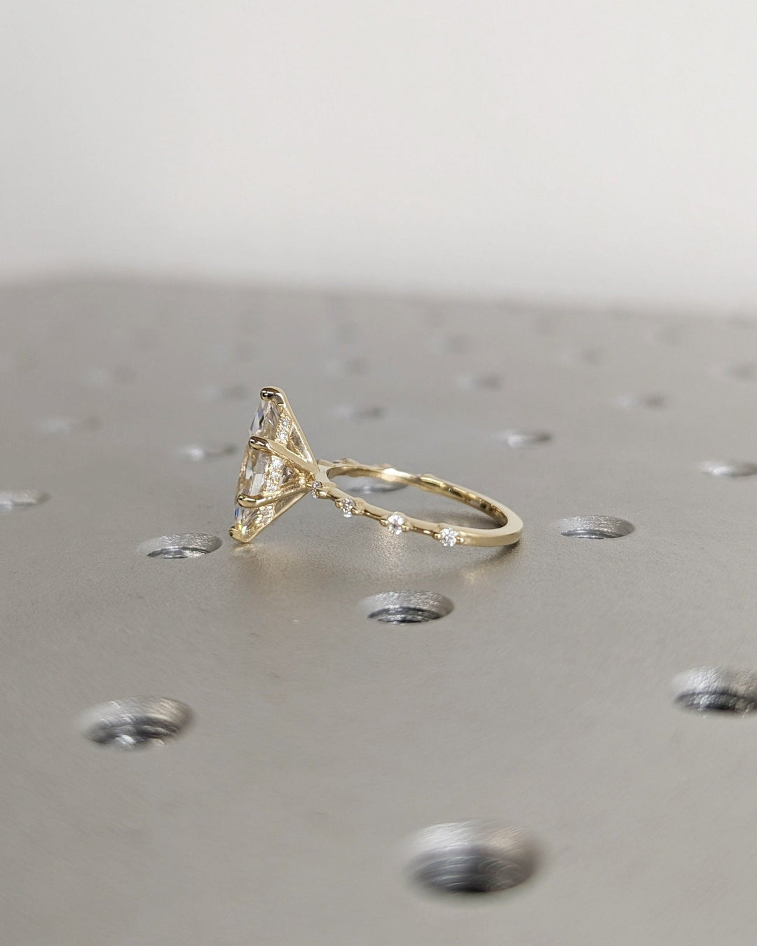 Elegant marquise diamond ring featuring hidden halo setting