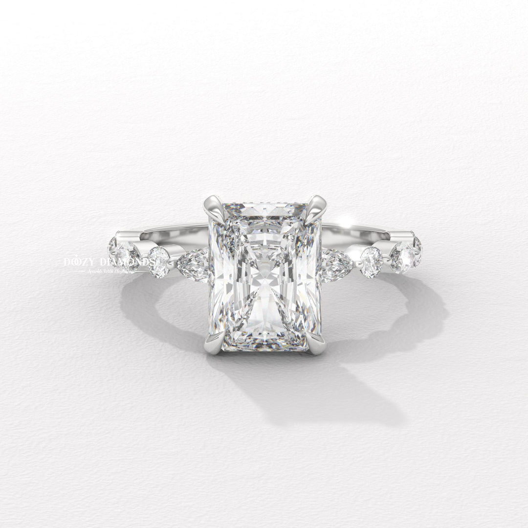 Radiant cut lab grown diamond ring
Marquise pavé engagement ring
Radiant diamond with marquise side stones