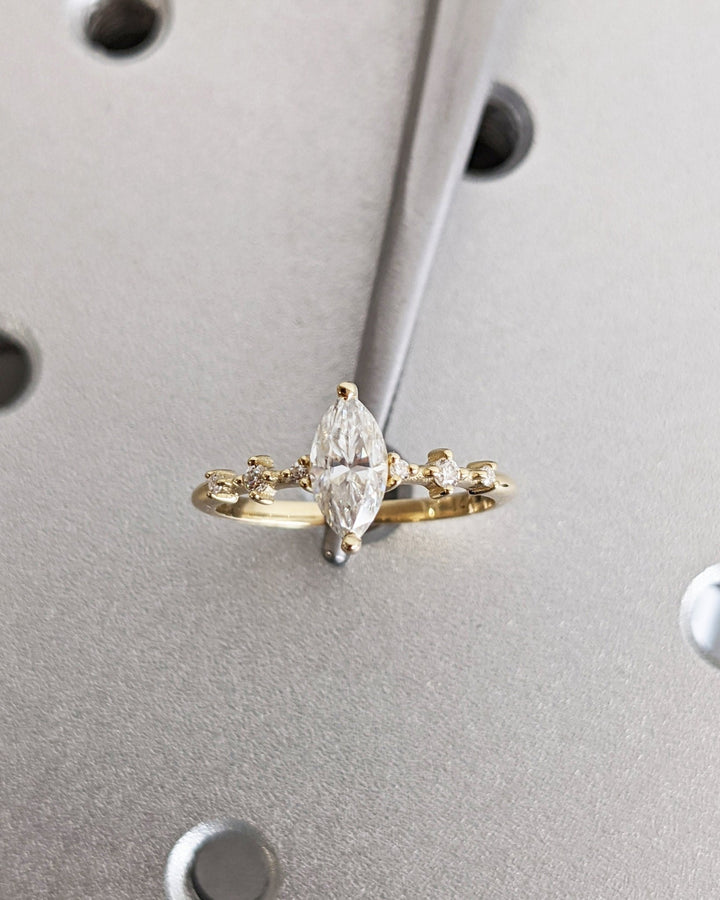 marquise engagement ring with glamorous pave setting