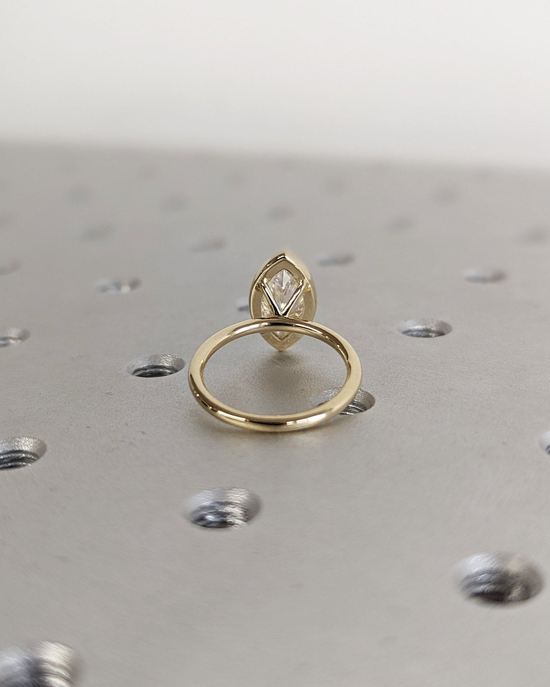 Sparkling marquise cut engagement ring with sleek setting