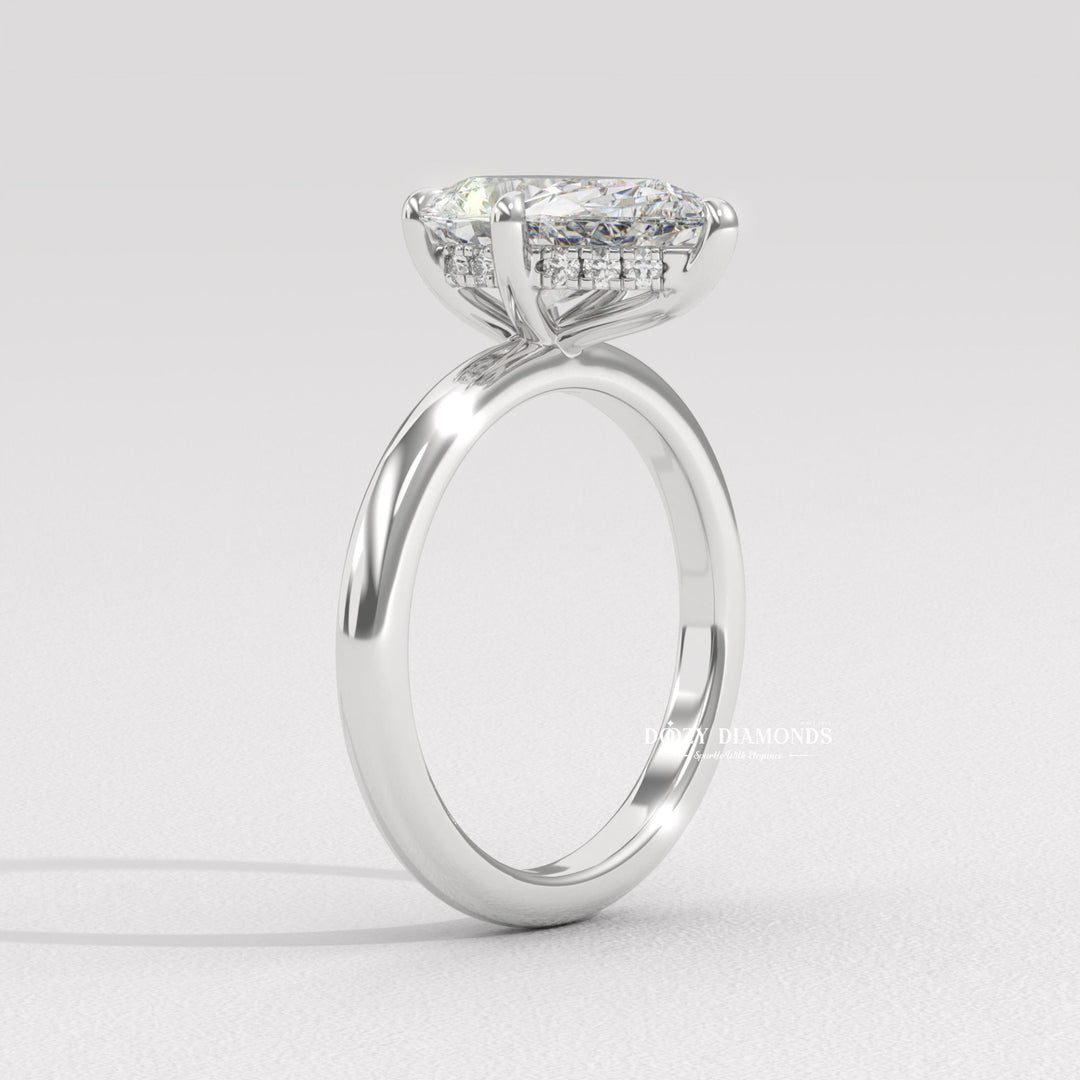 Pear shaped diamond ring with hidden halo
Teardrop diamond solitaire ring
Modern pear cut engagement ring
Low profile pear shaped engagement ring
Hidden halo pear diamond ring