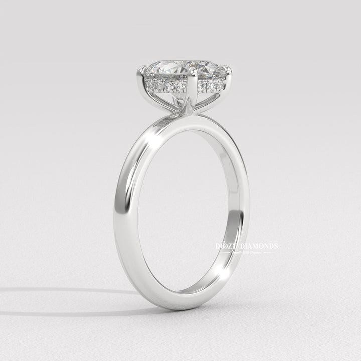 Oval diamond ring
Hidden halo engagement ring
Oval solitaire with hidden halo
Modern oval engagement ring
Classic oval yellow gold ring
Minimalist yellow gold ring