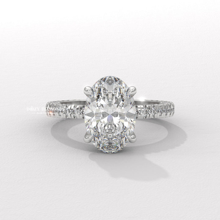 Triple pavé band oval ring
Oval cut hidden halo pavé ring
Micro pavé oval engagement ring
Oval solitaire with pavé accents