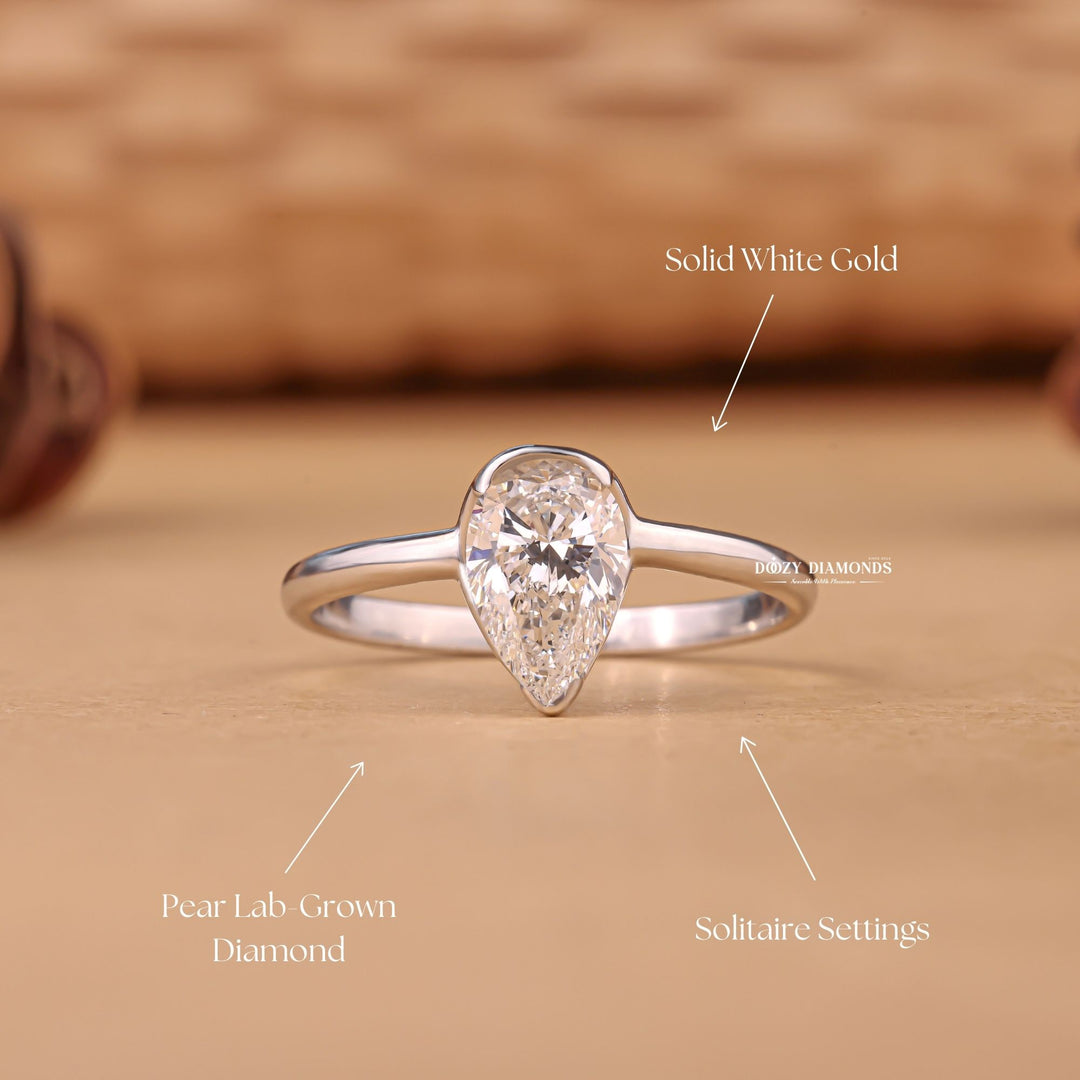 Pear glamorous diamond ring, Pear sophisticated diamond ring, Pear trendy diamond ring, Pear fashionable diamond ring, Pear versatile diamond ring, Pear ethical diamond ring, Pear sustainable diamond ring, Pear conflict-free diamond ring, Pear lab-grown