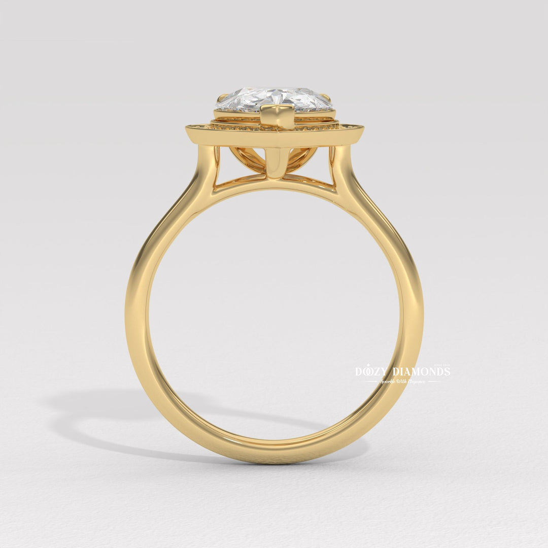 Pear shaped diamond halo setting
Pear cut white gold engagement ring
Pear cut rose gold halo ring
Pear diamond ring with side stones