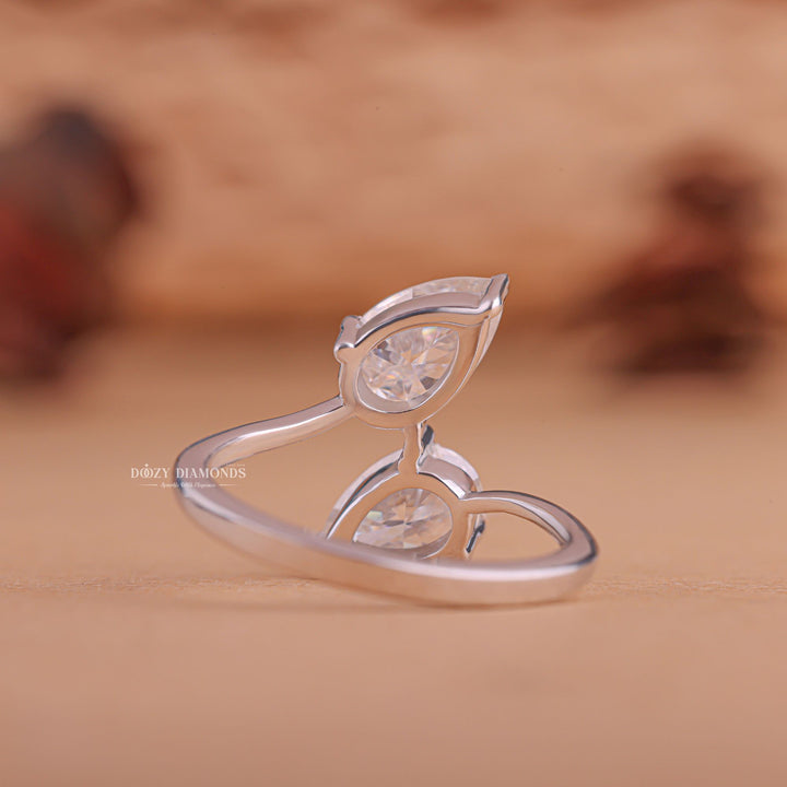 Pear bezel diamond ring, Pear tension set diamond ring, Pear split shank diamond ring, Pear channel set diamond ring, Pear swirl diamond ring, Pear unique diamond ring