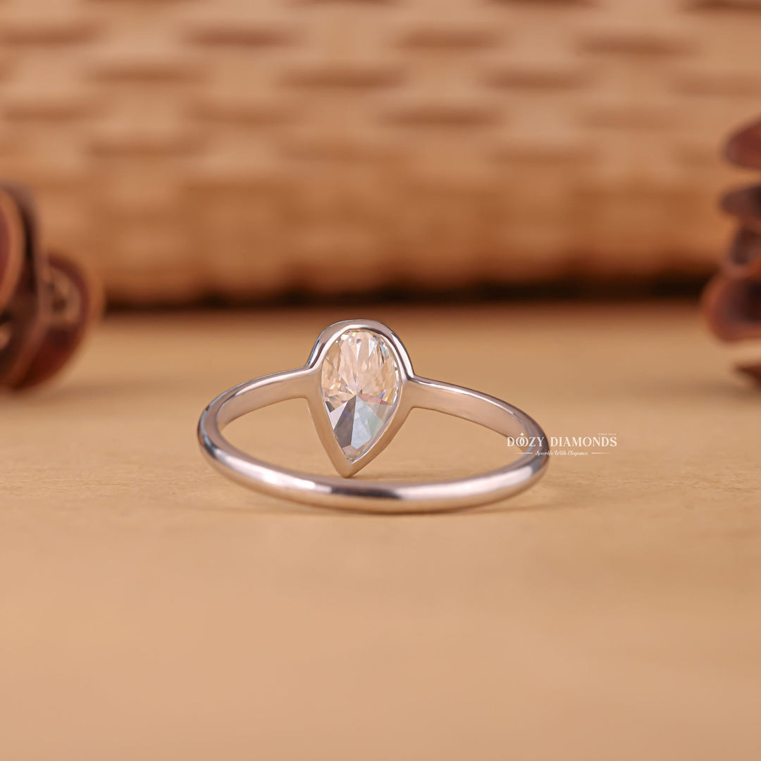  Pear minimalist diamond ring, Pear intricate diamond ring, Pear bold diamond ring, Pear delicate diamond ring, Pear timeless diamond ring, Pear elegant diamond ring, Pear whimsical diamond ring,