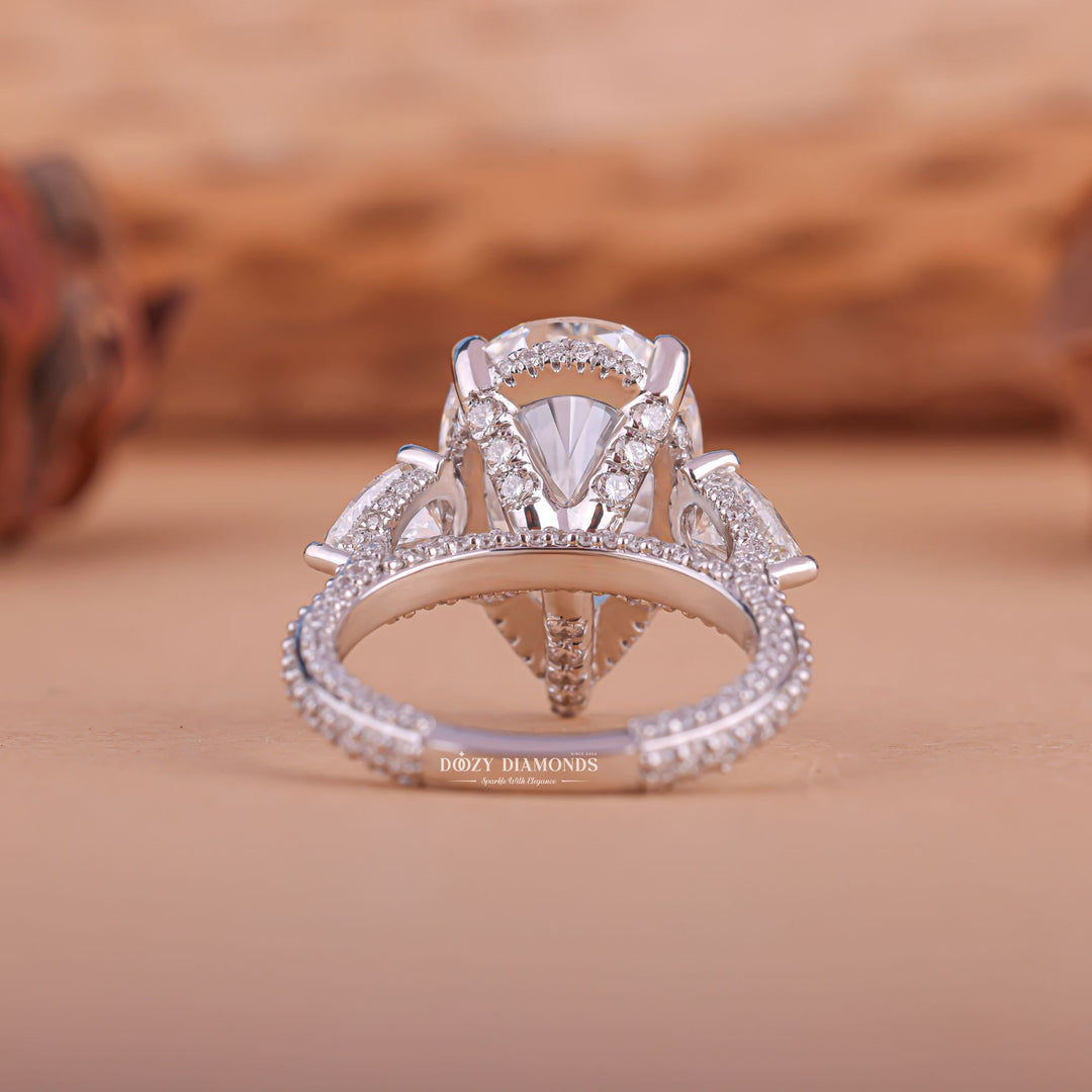 Pear minimalist diamond ring, Pear intricate diamond ring, Pear bold diamond ring, Pear delicate diamond ring, Pear timeless diamond ring, Pear elegant diamond ring, Pear whimsical diamond ring,