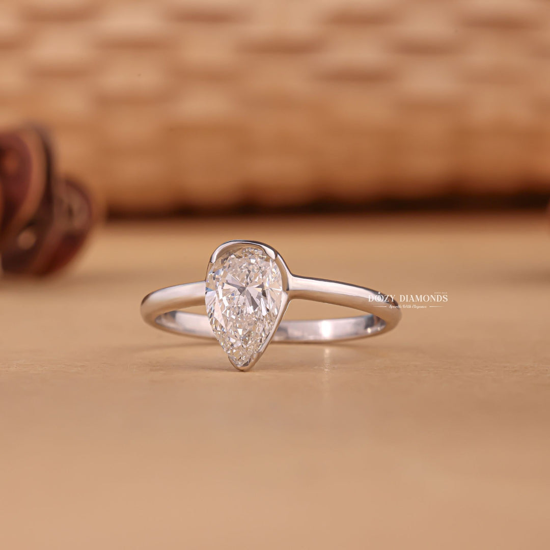  Pear tension set diamond ring, Pear split shank diamond ring, Pear channel set diamond ring, Pear swirl diamond ring, Pear unique diamond ring, Pear traditional diamond ring, Pear contemporary diamond ring