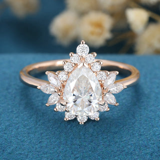 1-0-ct-pear-shaped-moissanite-cluster-engagement-ring-13