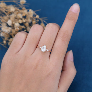 pear-shaped-moissanite-three-stones-engagement-ring