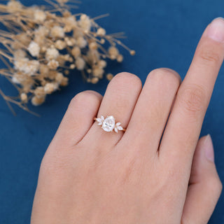 pear-shaped-moissanite-cluster-engagement-ring-15