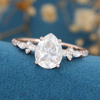 pear-shaped-moissanite-solitaire-pave-engagement-ring