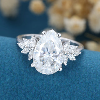 pear-shaped-moissanite-cluster-engagement-ring