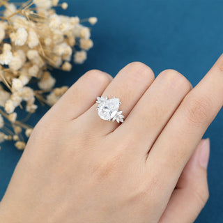 pear-shaped-moissanite-cluster-engagement-ring