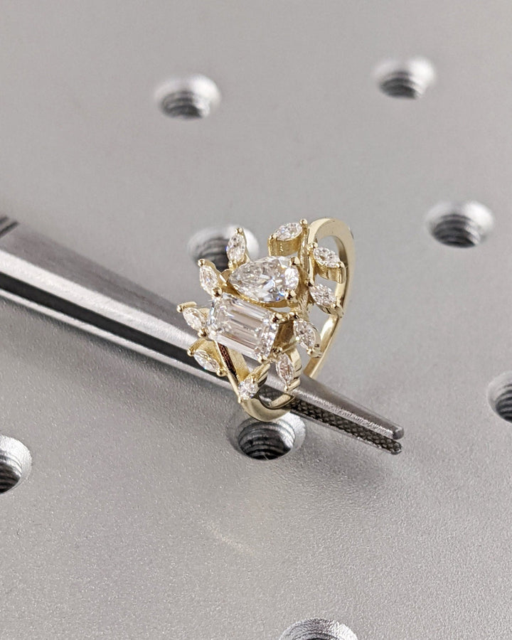 Timeless You and Me ring featuring emerald and pear diamonds