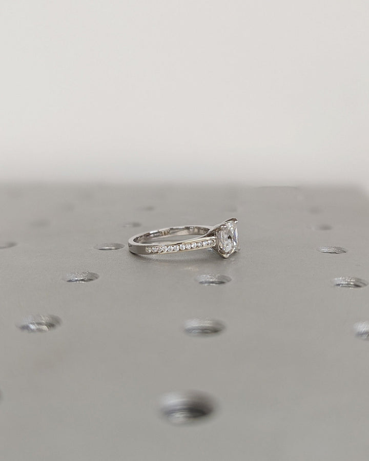 Sparkling asscher cut engagement ring with sleek channel setting