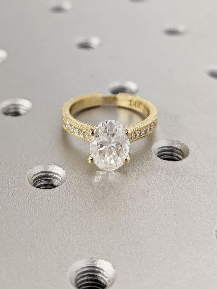 Luxury bridal ring with oval lab diamond centerpiece