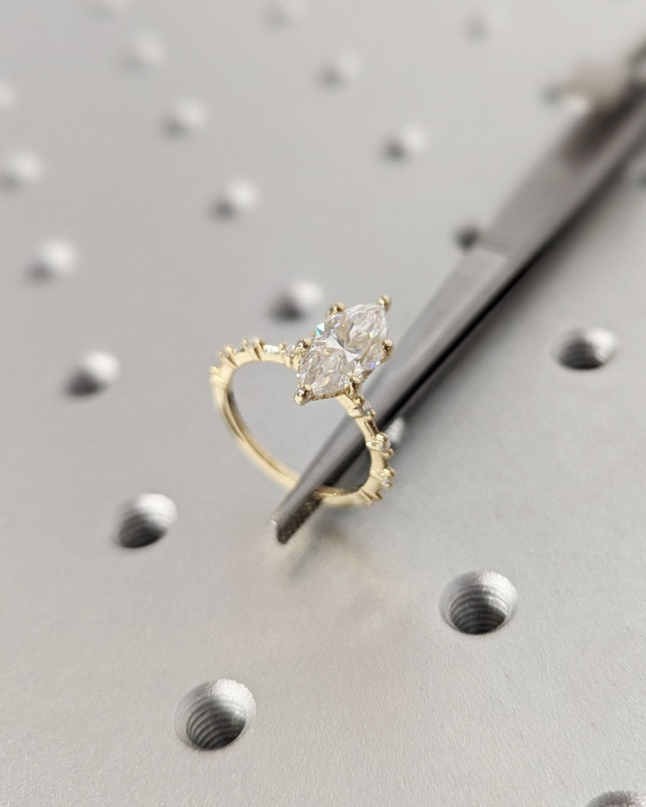Luxury bridal ring with marquise lab diamond centerpiece