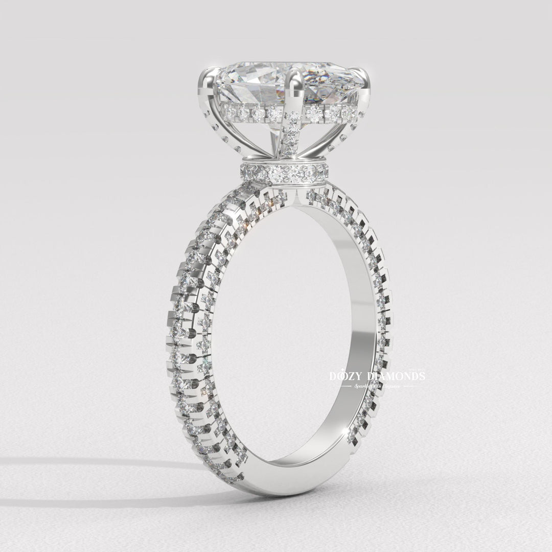 Oval solitaire with pavé accents
Unique three-sided pavé design
Sparkling oval pavé ring