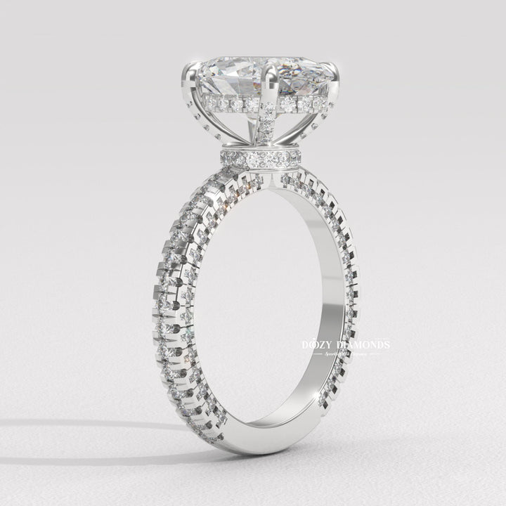 Oval solitaire with pavé accents
Unique three-sided pavé design
Sparkling oval pavé ring