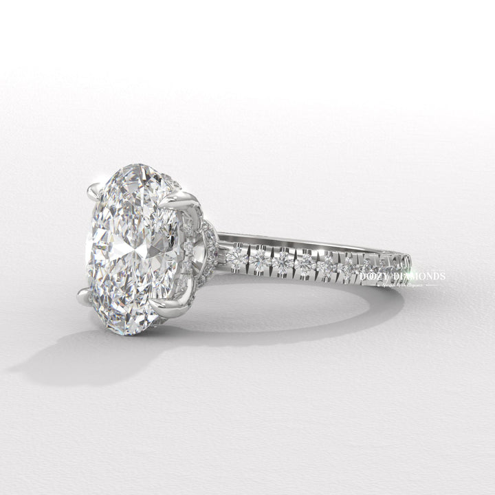 Unique three-sided pavé design
Sparkling oval pavé ring
Intricate pavé engagement ring