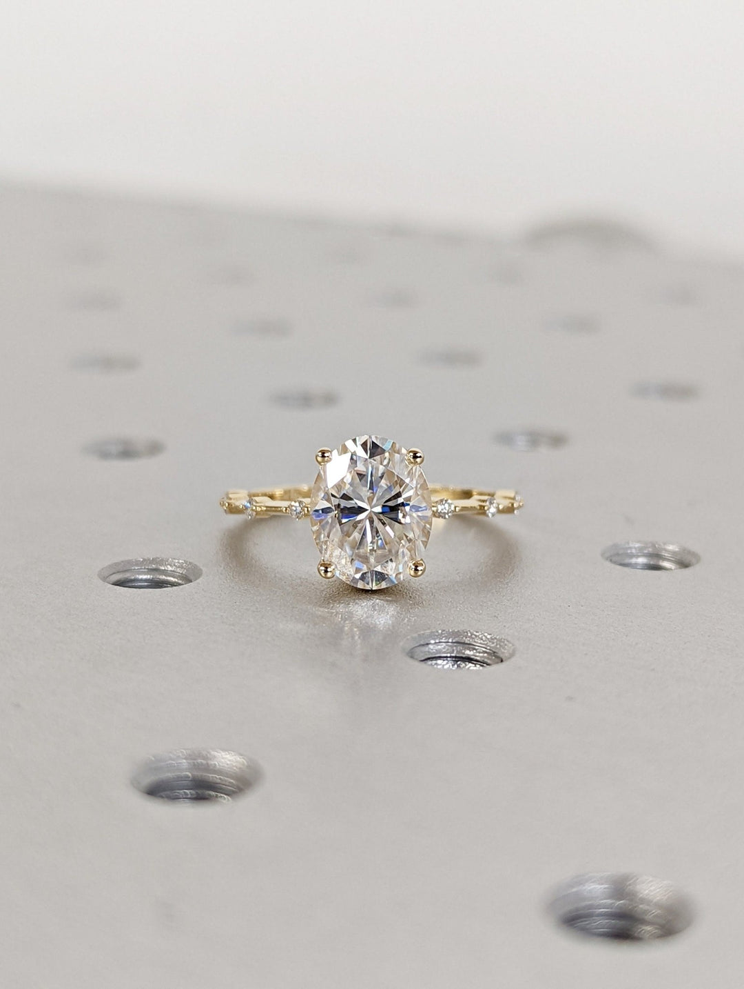Premium quality oval diamond ring with pave band