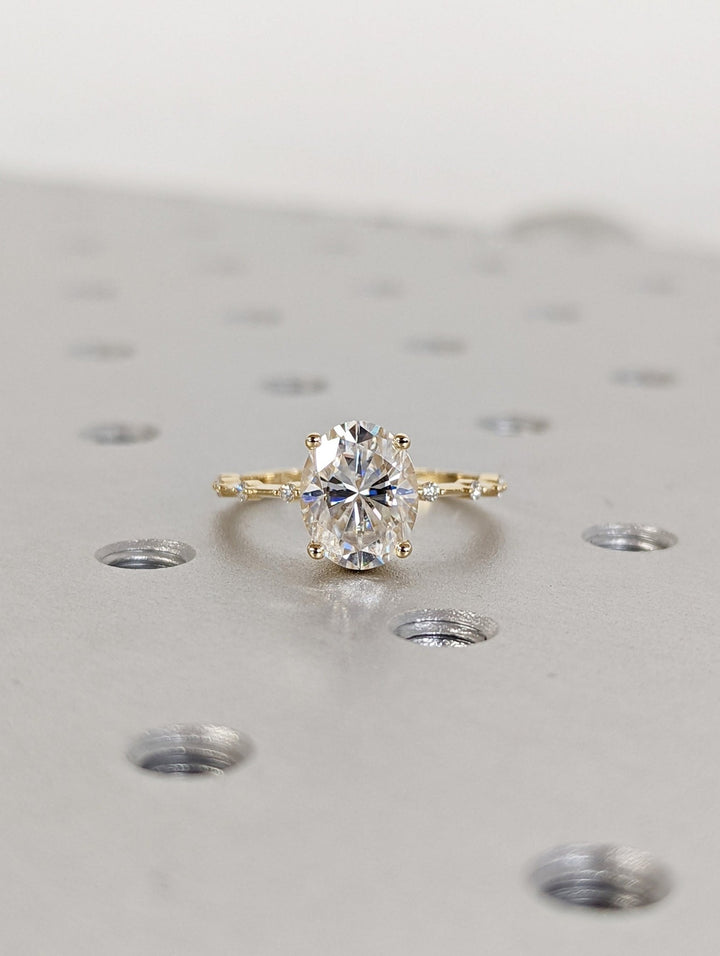 Premium quality oval diamond ring with pave band