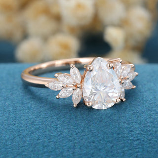 1-0-ct-pear-shaped-moissanite-cluster-engagement-ring-14