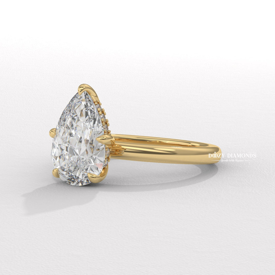 Solitaire pear cut diamond ring
Unique pear shaped engagement ring
Platinum pear shaped solitaire ring
18k gold pear cut diamond ring