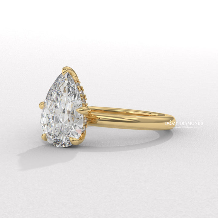 Solitaire pear cut diamond ring
Unique pear shaped engagement ring
Platinum pear shaped solitaire ring
18k gold pear cut diamond ring