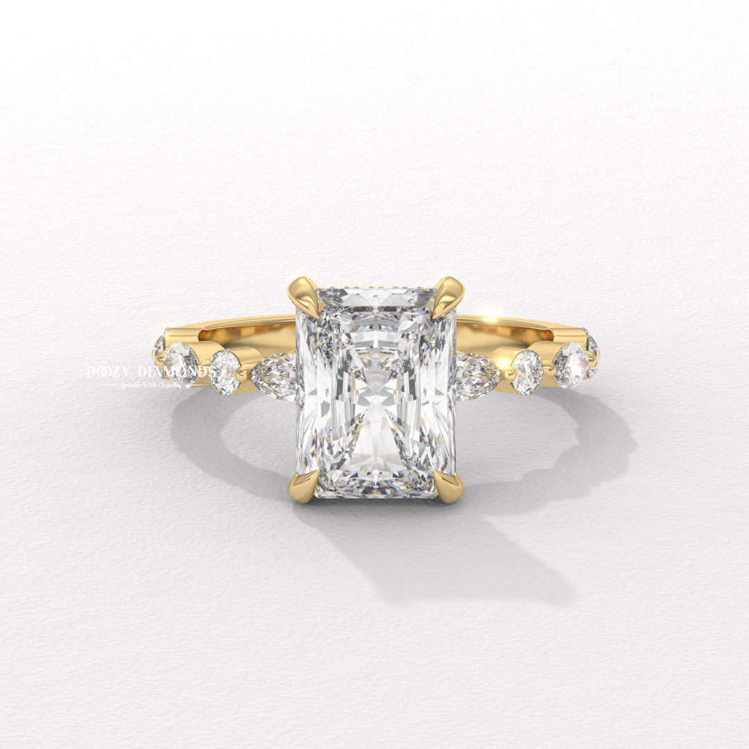 Unique marquise pavé setting
Radiant solitaire with marquise accents
Vintage inspired marquise pavé ring
Radiant cut diamond pavé band