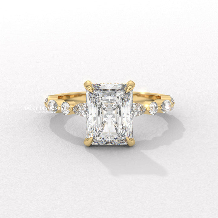 Unique marquise pavé setting
Radiant solitaire with marquise accents
Vintage inspired marquise pavé ring
Radiant cut diamond pavé band