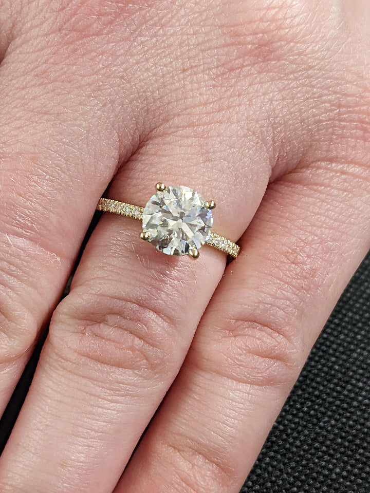 Sustainable luxury hidden halo diamond engagement ring
