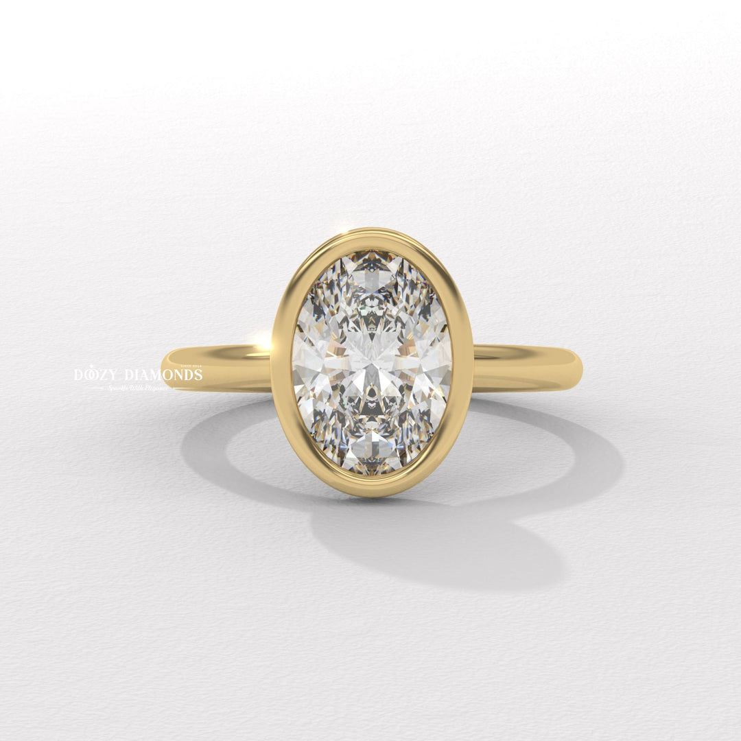 bezel set diamond ring, oval bezel engagement ring, modern bezel ring,