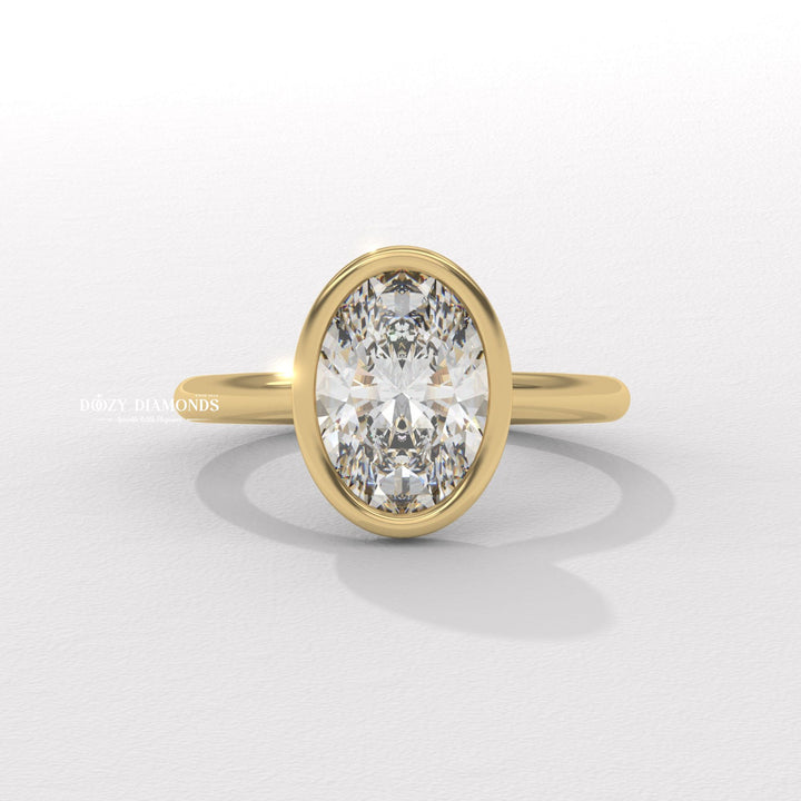 bezel set diamond ring, oval bezel engagement ring, modern bezel ring,